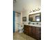 Well-appointed bathroom with granite countertop and wood cabinets at 11250 E Kilarea E Ave # 216, Mesa, AZ 85209