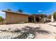 Large backyard with gravel, covered patio and BBQ area at 12059 S Paiute St, Phoenix, AZ 85044