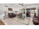 Spacious living room featuring tile floors and sliding glass doors at 12059 S Paiute St, Phoenix, AZ 85044