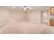 Spacious finished basement with neutral carpeting at 12061 W Miner Trl, Peoria, AZ 85383