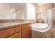 Elegant bathroom with a large soaking tub and double sinks at 12061 W Miner Trl, Peoria, AZ 85383