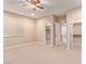 Spacious bedroom with ample closet space and neutral carpeting at 12061 W Miner Trl, Peoria, AZ 85383