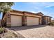 Three-car garage with paver driveway at 12061 W Miner Trl, Peoria, AZ 85383