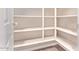 Well-lit pantry with ample shelving for storage at 12061 W Miner Trl, Peoria, AZ 85383