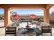 Relaxing patio with seating area and view of the pool at 12061 W Miner Trl, Peoria, AZ 85383