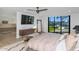 Main bedroom with pool view and ensuite bathroom access at 12075 N 76Th Ct, Scottsdale, AZ 85260