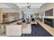 Modern living room with an open floor plan and a fireplace at 12075 N 76Th Ct, Scottsdale, AZ 85260