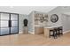 Modern wet bar with sleek cabinetry and quartz countertops at 12075 N 76Th Ct, Scottsdale, AZ 85260