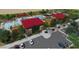 Aerial view of community pool, clubhouse, and parking at 12219 E Verbina Ln, Florence, AZ 85132