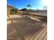 Spacious backyard deck overlooks a refreshing pool and beautifully landscaped yard at 12419 W Monte Vista Rd, Avondale, AZ 85392