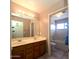 Bathroom with double sinks and a bathtub at 12419 W Monte Vista Rd, Avondale, AZ 85392