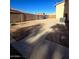 Landscaped side yard with concrete walkways and gravel areas at 12419 W Monte Vista Rd, Avondale, AZ 85392