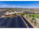 Aerial view of community center, parking lot, and green space at 12539 W Shadow Hills Dr, Sun City West, AZ 85375