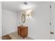 Bright entryway with a mid-century modern console table at 12539 W Shadow Hills Dr, Sun City West, AZ 85375