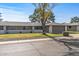 Front view of a ranch-style house with a spacious driveway at 12539 W Shadow Hills Dr, Sun City West, AZ 85375