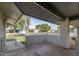 Stone patio and brick wall providing a view of the neighborhood at 12539 W Shadow Hills Dr, Sun City West, AZ 85375