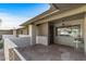 Covered patio with brick columns and a wrought iron gate at 12539 W Shadow Hills Dr, Sun City West, AZ 85375