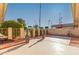 Private backyard patio with wrought iron fencing and landscaping at 13614 N Hawthorn Dr, Sun City, AZ 85351