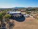 Aerial view of a single-story home with a large backyard and desert views at 13648 E Aloe Vera Dr, Scottsdale, AZ 85262