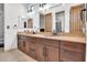 Bathroom with double vanity and copper fixtures at 13648 E Aloe Vera Dr, Scottsdale, AZ 85262