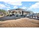 View of the house exterior showcasing a covered patio and landscaping at 13648 E Aloe Vera Dr, Scottsdale, AZ 85262