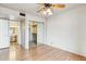 Bright bedroom with mirrored closet doors and wood flooring at 14645 N Fountain Hills Blvd # 217, Fountain Hills, AZ 85268