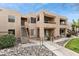 Condo building with stairs and pathway leading to individual units at 14645 N Fountain Hills Blvd # 217, Fountain Hills, AZ 85268