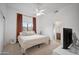 Main bedroom with king bed and ensuite bath at 15020 E Sierra Madre Dr, Fountain Hills, AZ 85268