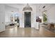 Bright and airy entryway with high ceilings and a view into the living room at 15020 E Sierra Madre Dr, Fountain Hills, AZ 85268