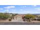 Single-story home with two-car garage and desert landscaping at 15020 E Sierra Madre Dr, Fountain Hills, AZ 85268