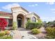 Spanish style home with landscaped front yard, walkway, and desert landscaping at 15020 E Sierra Madre Dr, Fountain Hills, AZ 85268