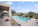 Resort-style pool and patio with lush landscaping and seating at 15020 E Sierra Madre Dr, Fountain Hills, AZ 85268