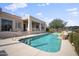 Inviting backyard pool with waterfall feature and ample deck space at 15020 E Sierra Madre Dr, Fountain Hills, AZ 85268