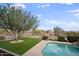 Luxury backyard oasis with a refreshing pool and green lawn at 15020 E Sierra Madre Dr, Fountain Hills, AZ 85268