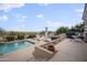 Stunning pool and patio with lounge chairs and grill area at 15020 E Sierra Madre Dr, Fountain Hills, AZ 85268