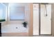 Bathroom with a soaking tub and separate shower at 16549 W Desert Ln, Surprise, AZ 85388