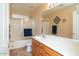 Bathroom with a shower/tub combo and double vanity at 16549 W Desert Ln, Surprise, AZ 85388