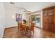 Bright dining room with pool view and wood cabinetry at 16837 E Lunar Ln, Fountain Hills, AZ 85268