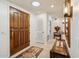 Bright entryway with wood floors and a wooden console table at 16837 E Lunar Ln, Fountain Hills, AZ 85268