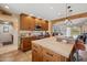 Large kitchen with an island and granite countertops at 16837 E Lunar Ln, Fountain Hills, AZ 85268