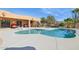 Inviting kidney-shaped pool with a large patio area at 16837 E Lunar Ln, Fountain Hills, AZ 85268