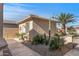 Small casita with walkway and desert landscaping at 16935 W Villagio Dr, Surprise, AZ 85387