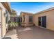 Spacious courtyard with a pathway leading to the home's entrance and other areas at 16935 W Villagio Dr, Surprise, AZ 85387