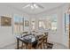 Cozy dining area with wood table and chairs, near kitchen at 16935 W Villagio Dr, Surprise, AZ 85387