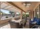 Outdoor patio with seating area, great for entertaining at 16935 W Villagio Dr, Surprise, AZ 85387