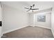 Well-lit bedroom with ceiling fan and neutral decor at 1744 W Encinas St, Gilbert, AZ 85233