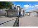 Two-story house with tile roof, two-car garage, and desert landscaping at 1744 W Encinas St, Gilbert, AZ 85233