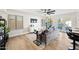 Light-filled living room featuring hardwood floors and access to backyard at 1744 W Encinas St, Gilbert, AZ 85233