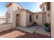 Landscaped side yard with flagstone pathway and mature plants at 18970 N Alicante St, Maricopa, AZ 85138