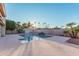 Relaxing pool area with a view of lush landscaping at 19662 N 93Rd Dr, Peoria, AZ 85382